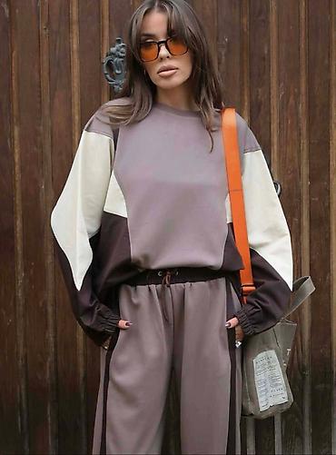 Gornji i donji deo: Dvončani ženski komplet – duks i široke pantalone - Kroj: opušten — 2