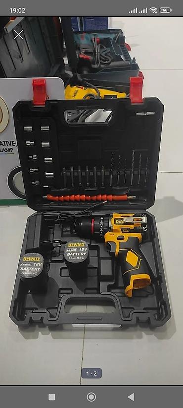 qab alan: DEWALT 18V Li-Ion akkumulyatorlu matkap/şurupkalı seti Xüsusiyyətlər — 1