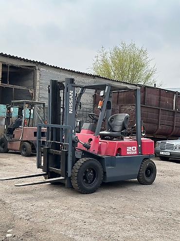 tir: Погрузчик, Nissan, 2010 г., Колесный, Вилочный — 2