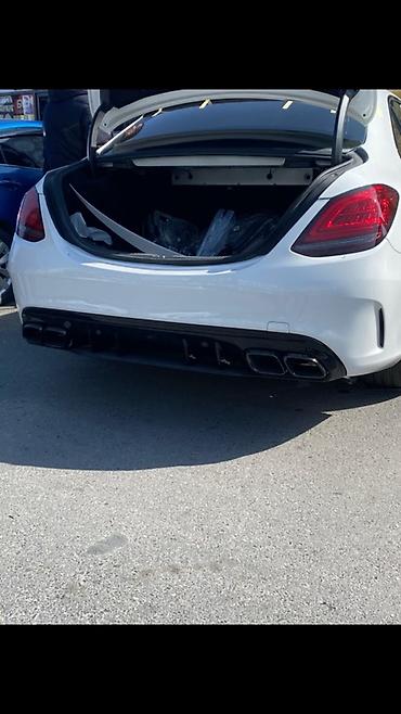 diffuzer: Mercedes w205 amg difuzer nasatkalarla bir yerdə — 1