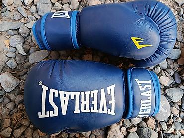 футы кикбокс: 1) Перчатки Everlast, цвет синий 8oz
2) Борцовки green hill 35 размер — 1