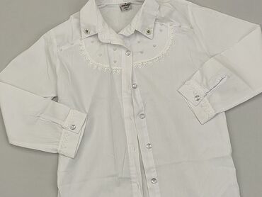 biała koszulka z długim rękawem: Koszula 10 lat, stan - Dobry, wzór - Jednolity kolor, kolor - Biały