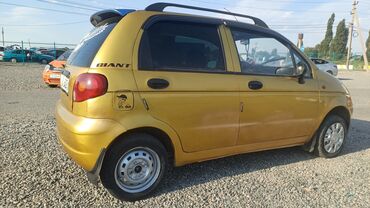 мини электромобиль: Хэтчбек Daewoo Matiz золотистого цвета – компактный городской