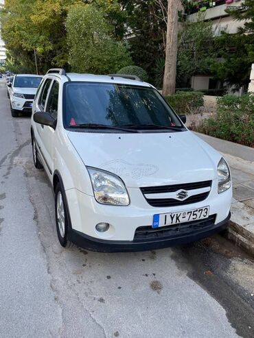Suzuki: Suzuki Ignis: 1.3 l. | 2004 έ. 98750 km. Χάτσμπακ