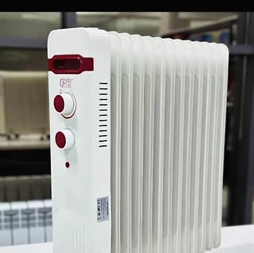 Масляные обогреватели: Масляный обогреватель Кол-во секций: 7, Быстрый нагрев, Встроенный вентилятор, Несколько режимов мощности — 10