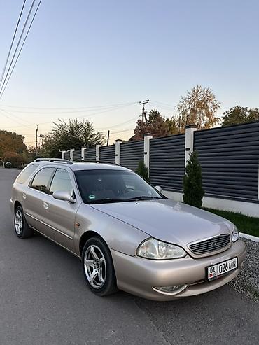 айнек рамка: Kia Clarus: 2000 г., 2 л, Автомат, Бензин, Универсал — 4