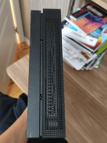 xbox seris x: Xbox One X 1TB oyun konsolu Xüsusiyyətlər: - 1TB daxili yaddaş – — 9