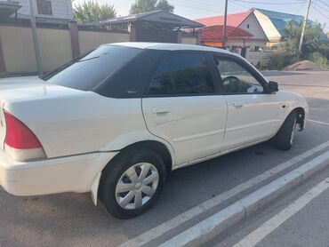 мазда 323 седан: Mazda 323: 2000 г., 1.6 л, Автомат, Бензин, Седан