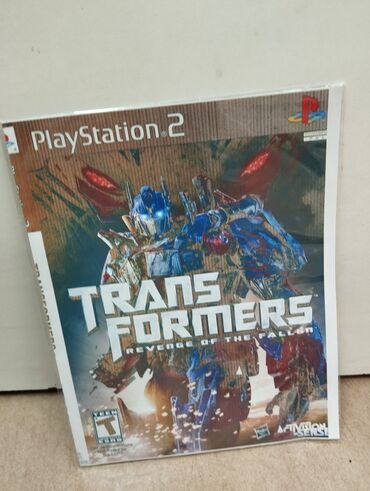 Oyun diskləri: PlayStation 2 üçün God of War oyunu. Rus və İngilis dillərində — 6