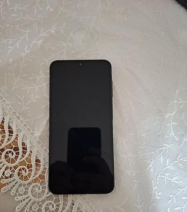 samsunq a 17: Samsung Galaxy A17, 128 GB, rəng - Qara, Barmaq izi — 2