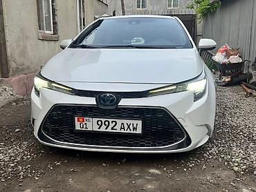 шильдик гибрид: Toyota Levin: 2020 г., 1.8 л, Вариатор, Гибрид, Седан — 8