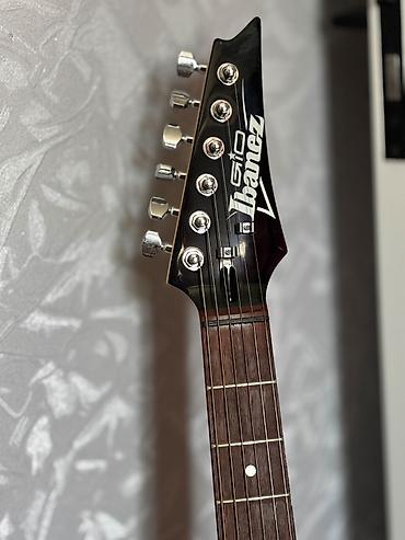 Gitaralar: * Marka: Ibanez * Tip: Elektro gitara * 3 pikap: H–S–H quruluşu — iki — 3