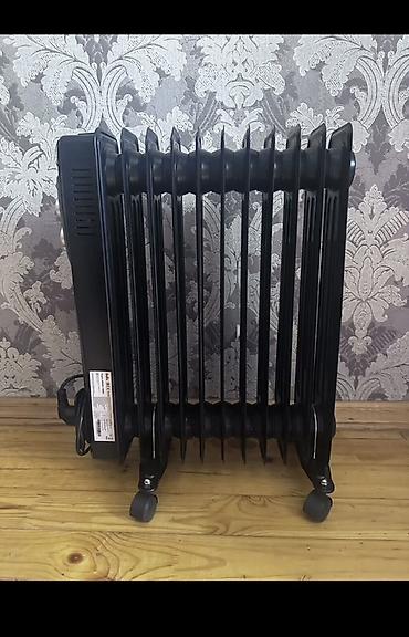 atena yag: Ballu yağlı radiator – elektriklə işləyən, qara rəngli, təkərli model — 1