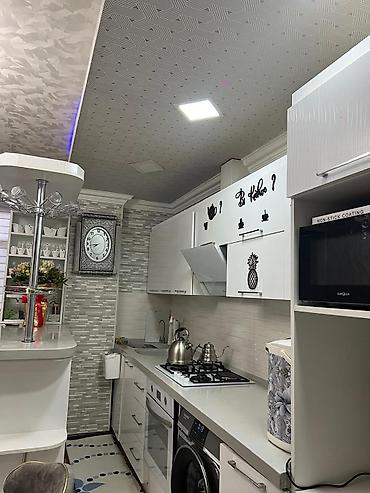 bayil ev satisi: 2 otaqlı mənzil – studiya tipli qonaq otağı/mətbəx və ayrıca yataq — 1