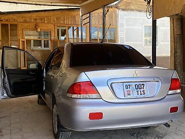 мото каракол: Mitsubishi Lancer: 2006 г., 1.3 л, Седан — 1