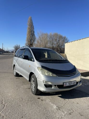 срочно продаю автомобиль: Серебристый минивэн Toyota Estima 2.4 газ с рейлингами на крыше. Этот