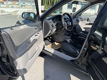Транспорт: Mazda 323: 2002 г., 1.6 л, Механика, Бензин, Хэтчбэк — 8