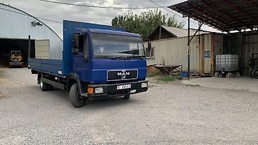man tgx: Ман гигант ман Срочно срочно бортовой срочно грузовик MAN синего — 1
