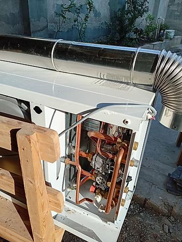 Təmir və tikinti: Yeni Kombi Herman 32 kVt — 4