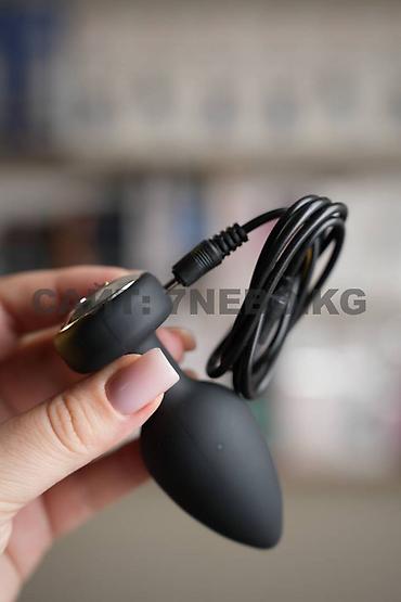 Товары для взрослых: Анальная вибропробка на пульте управления - 10 режимов вибрации Это — 7