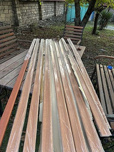 laminat döşəmə: MDF taxta rəngli plintus/profil zolaqları - Material: MDF əsaslı — 4