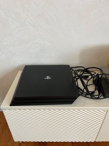 irşad playstation 3: Ps 4 pro 1 TB. Ev də isdəfadə edilib,2 ədəd orjinal pult,4k kabel