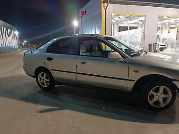 tayota progres: Mitsubishi Carisma: 1997 г., 1.8 л, Автомат, Бензин — 4