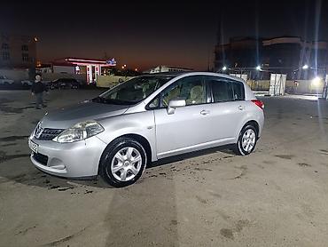 su satan yerler: Nissan Tiida, 5 qapılı hetçbek, gümüşü rəng. - Sərfəli şəhər — 3