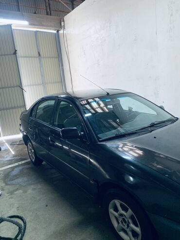 Toyota: Toyota Avensis: 1998 г., 1.8 л, Механика, Газ, Седан