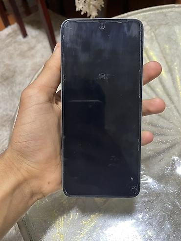 bakida kamera satisi: Redmi 128 GB, rəng - Mavi, Barmaq izi — 2