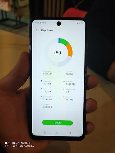 magic 6 pro: Smartfon – 6.6” ətrafı ölçüdə tam ekranlı, mərkəzə yaxın “punch‑hole” — 3
