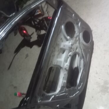 Mühərrik və mühərrik detalları: Kia rio qapisi. sol teref. qabag eziy. yoxdu. qara reng. yugul cizig