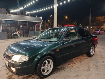 муссо автомабил: Mazda 323: 1999 г., 1.6 л, Механика, Бензин, Седан