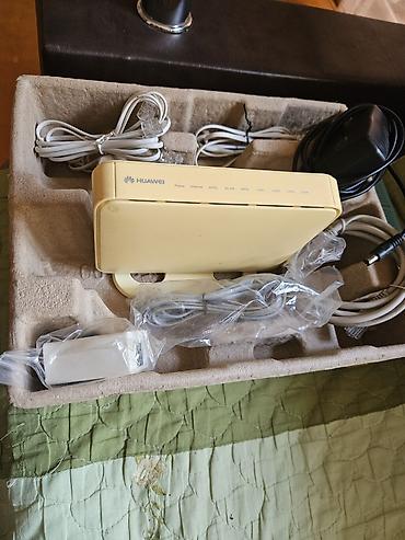 Huawei ADSL Wi‑Fi marşrutlayıcı Xüsusiyyətlər: - ADSL internet