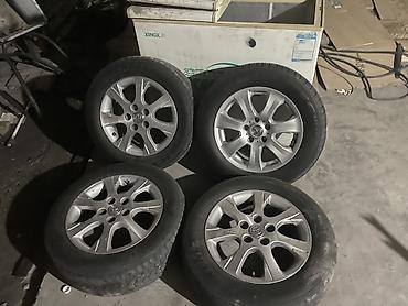 5 110: Комплект из 4 штатных литых дисков Toyota с шинами. Характеристики: - — 3