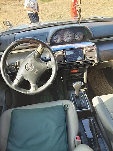 nissan note bufer: Nissan X-Trail (T30) – gümüşü rəngli, benzinlə çalışan kompakt SUV — 5