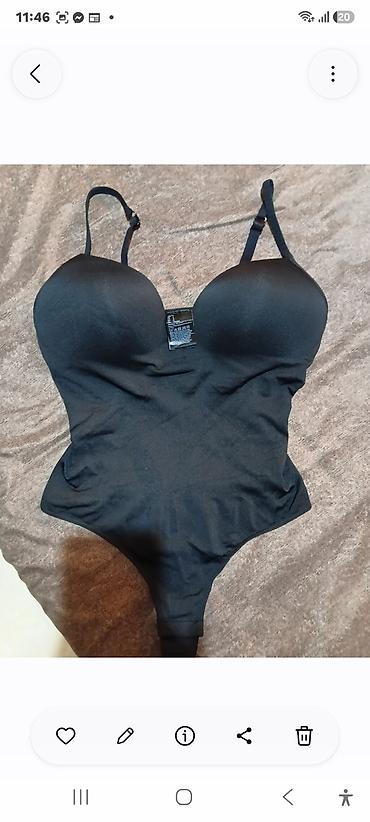 H&M bodi bez šavova – Light Shape, crni - Model sa tankim na lalafo.rs H&M bodi bez šavova – Light Shape, crni - Model sa tankim