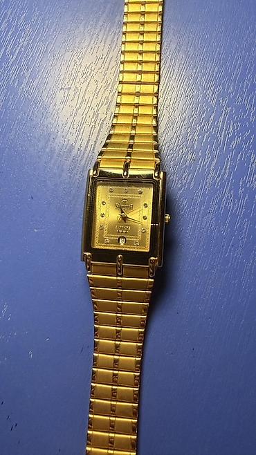 ipod nano 6: Swistar kişi qol saatı - Korpus və qolbaq: 23K qızıl örtük — 2