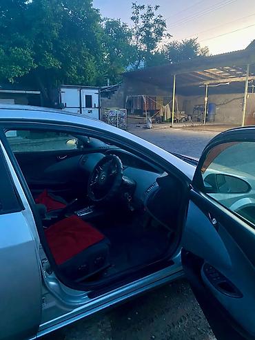Nissan Primera: 2002 г., 2 л, Вариатор, Бензин, Универсал — 8