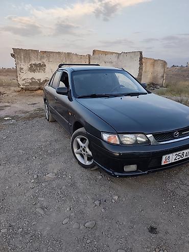 12 t: Mazda 626: 1997 г., 1.8 л, Механика, Бензин, Седан — 2
