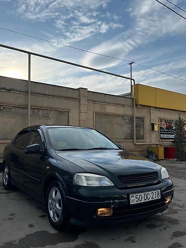 Opel: Model: Opel Astra G sedan Kuzov: 4 qapı, tünd yaşıl rəng Mühərrik və — 1
