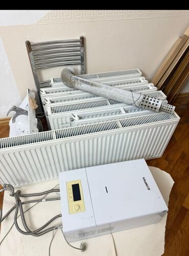isti döşəmə: *ZB* *28 KOMBI+5 RADIATOR* Qiymət *650 AZN* cəmi 1 il işlənib ünvan 9