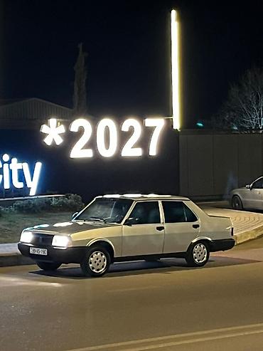 Tofas: Model: Tofaş Şahin (sedan) Kuzov: 4 qapılı, gümüşü rəng, qara plastik — 4