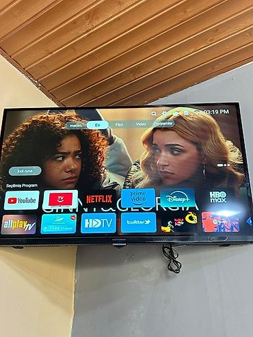 divarda televizor yeri: Yeni Televizor Hoffmann LED ekran 32" FHD (1920x1080) — 1
