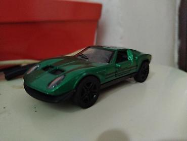 şaxta baba oyuncagi: Yaşıl rəngli oyuncaq idman avtomobili. Model klassik sport kar — 1