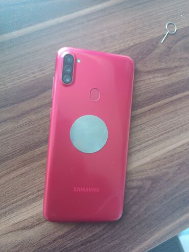 samsung gt c3110: Samsung Galaxy A11, 32 GB, rəng - Qırmızı, Düyməli, Barmaq izi, İki sim kartlı