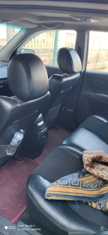 hyundai county: Hyundai Tucson: 2 л | 2009 г. Кроссовер