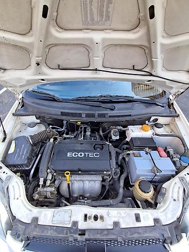 aveo ekran: Chevrolet Aveo: 1.4 l | 2010 il 100 km Sedan — 9
