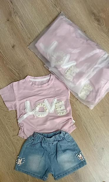 Dəstlər: Uşaq geyim dəstləri 1) Krem rəngli 2 hissəli dəst: - Qolsuz jilet — 9