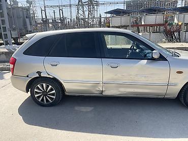 ротационная борона: Mazda 323: 2001 г., 1.6 л, Механика, Бензин, Универсал — 3